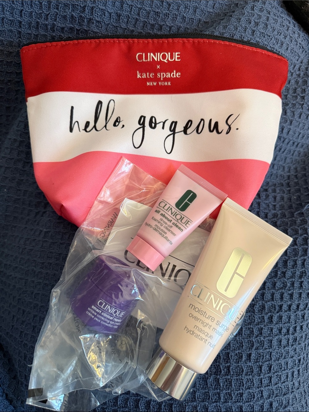 Clinique Skincare Trio with Pink and Red Striped Pouch